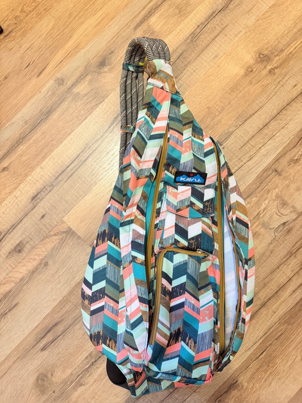 Kavu Multicolor Chevron Sling Pack with Teal and Coral Accents